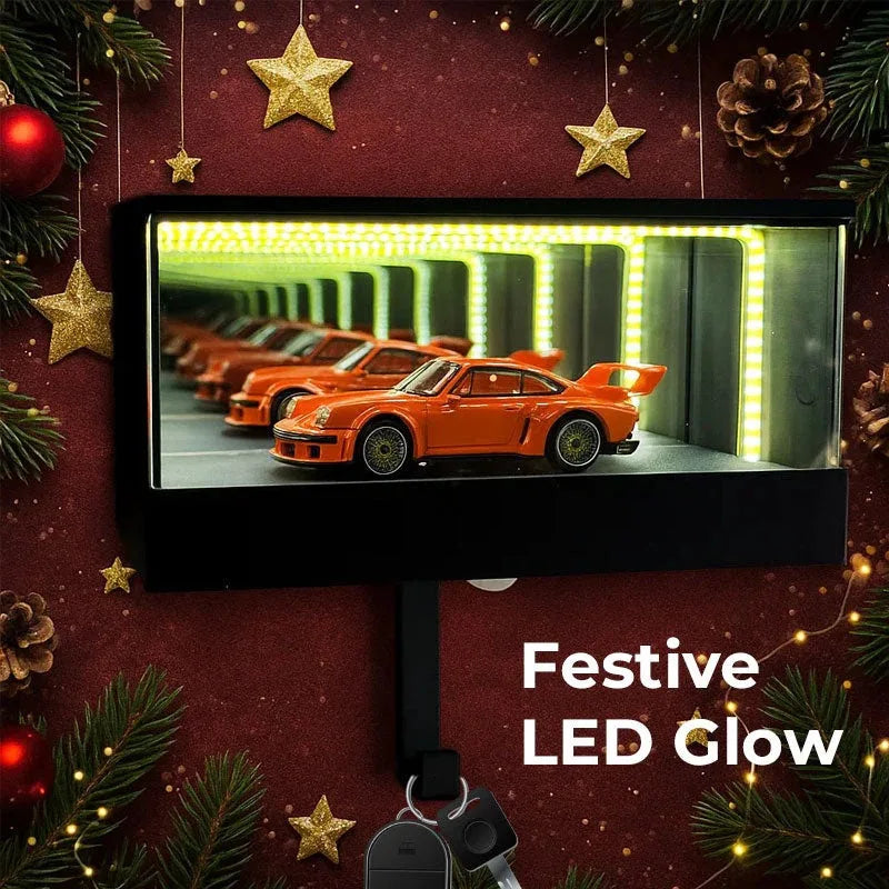 Decorative display with orange car on a screen, surrounded by Christmas decorations and labeled 'Festive LED Glow'.