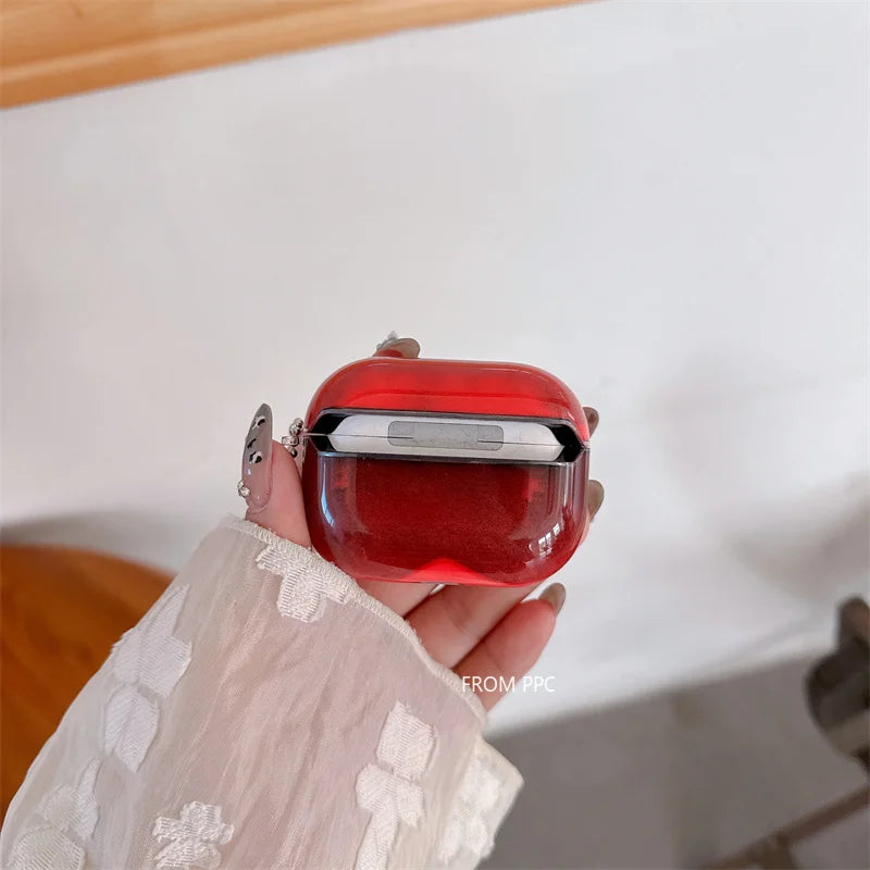 Red case held by a hand with a white lace sleeve on a light background